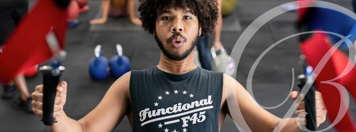 young man works out at the F45 gym